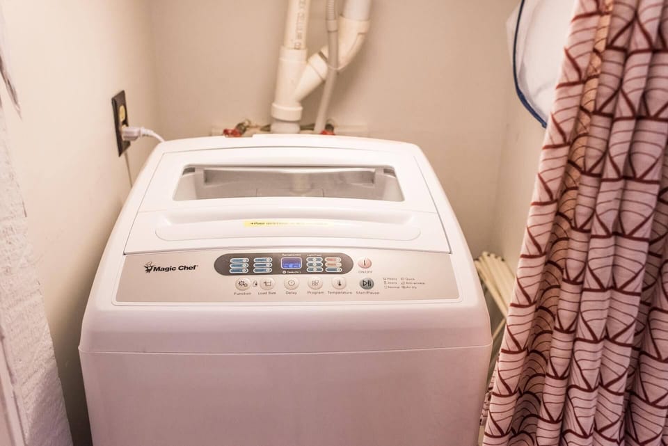 Energy efficient compact washer, with drying rack or line dry outside.