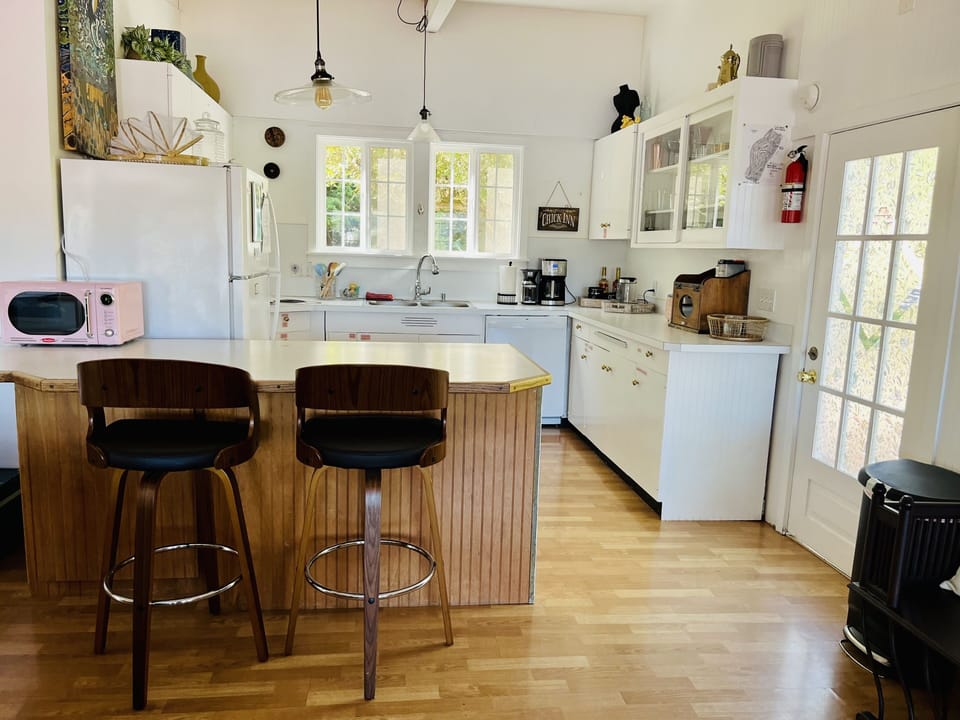 Kitchen bar. The bar seats 2 people. 