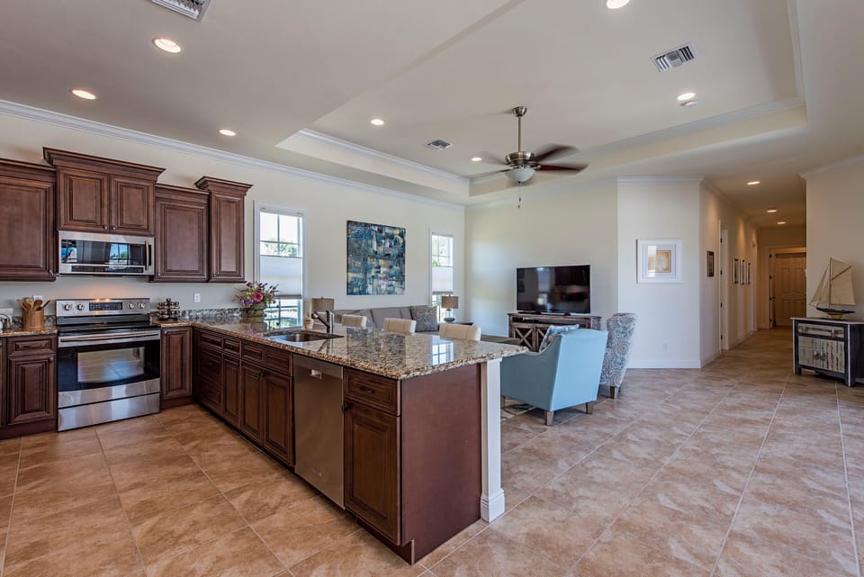 Main living area & kitchen. Professionally decorated  spotless upon arrival
