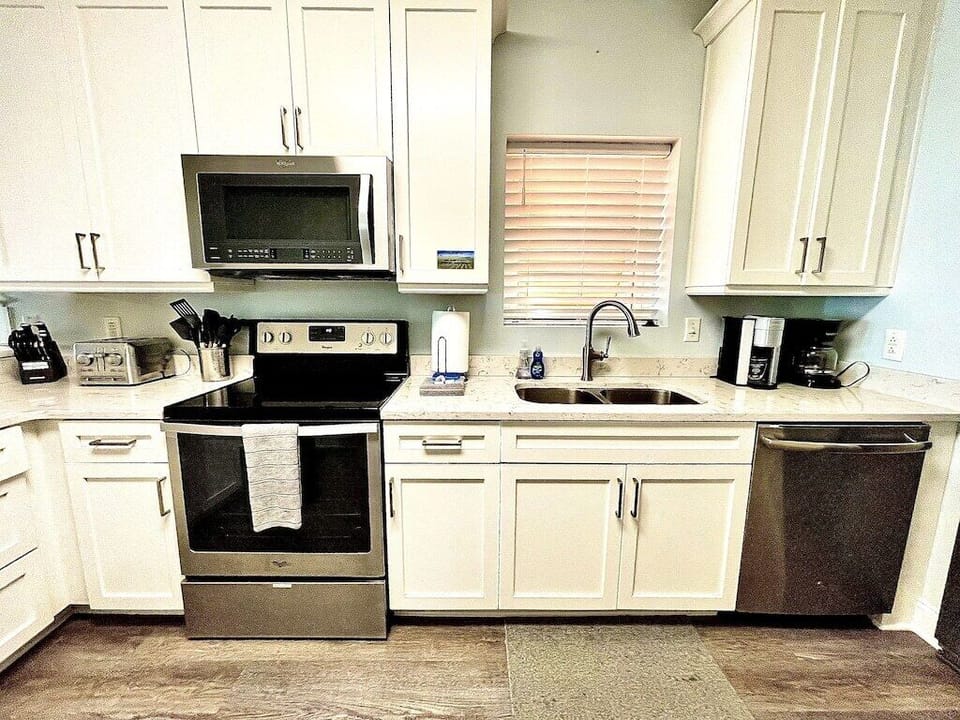 Kitchen with stainless steel appliances Oceanview, 102 Isle of Palms, SC | IOP Escapes