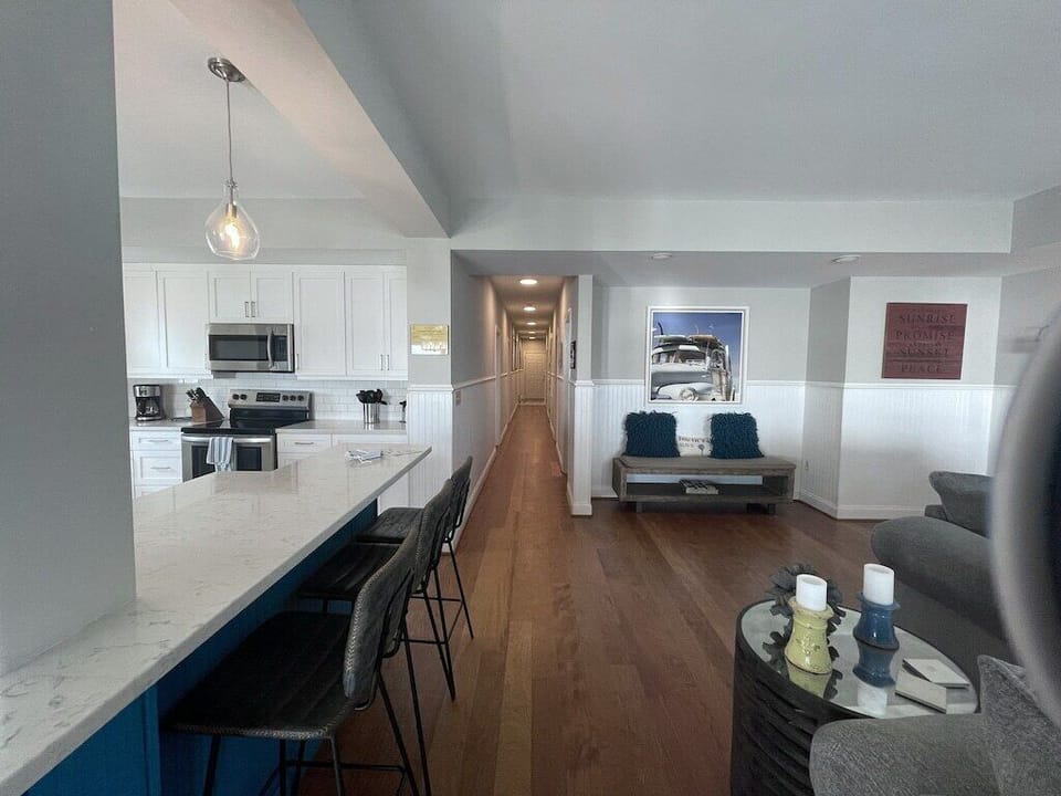 Open concept living and kitchen area Oceanview 302, Isle of Palms, SC | IOP Escapes