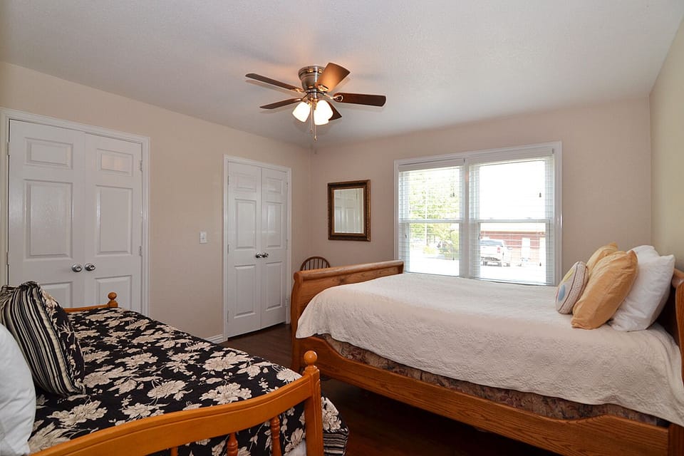 Guestroom #2 with a twin and queen size bed.