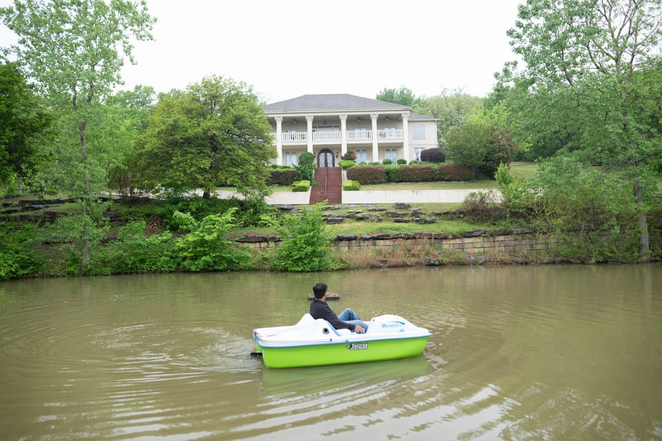 Paddle boat in private pond with view of the house.  Great for group photos
