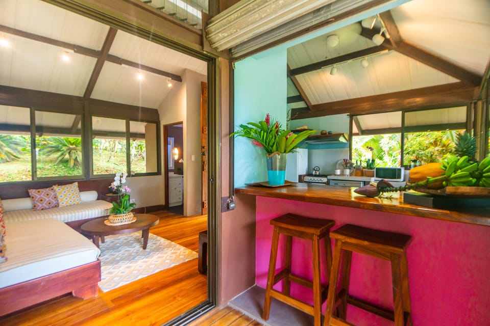 Villa Cacao. Another view of the kitchen with bar and the sitting area. 