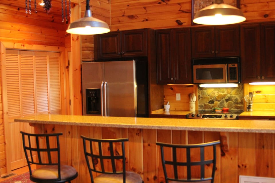 Bar table and chairs in kitchen