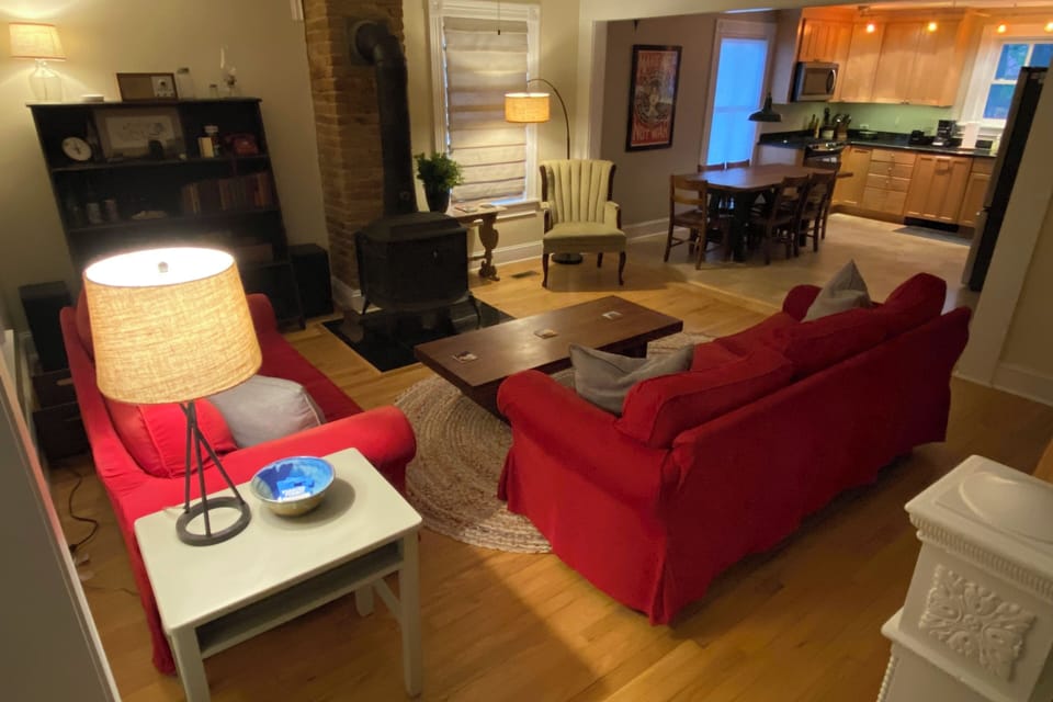Living room with view into kitchen 