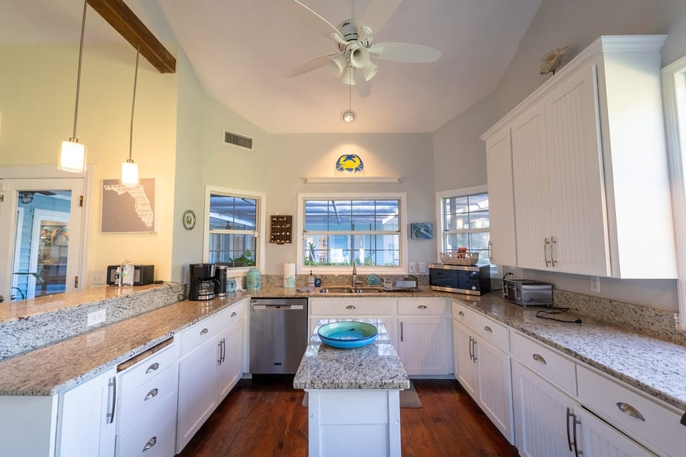 This is a well-stocked kitchen for cooking with family. And grill on the lanai!