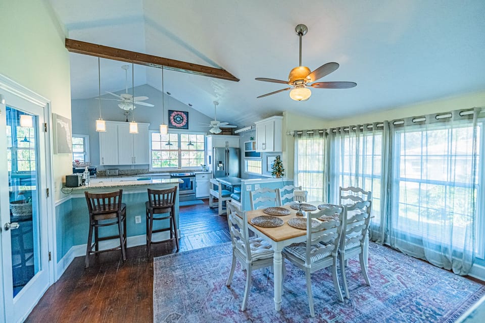 Dining room and kitchen. Seats 6 at dining table and 2 at the counter bar. 