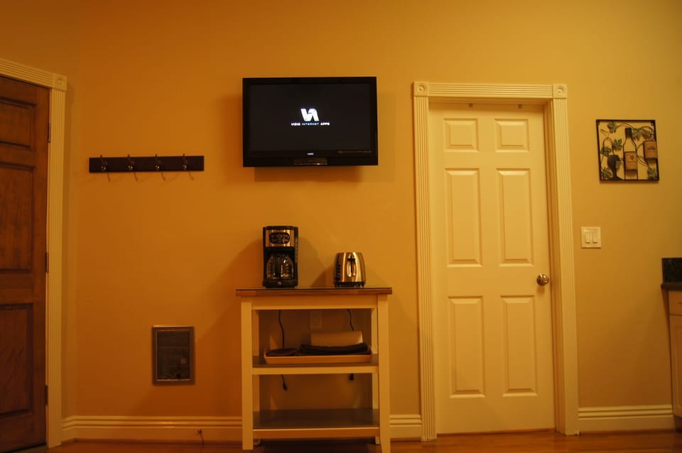 Living Room Features LED Smart TV with Streaming Capability.