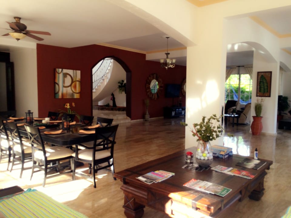 Beautiful, grand & spacious main living area including large dining table & bar!