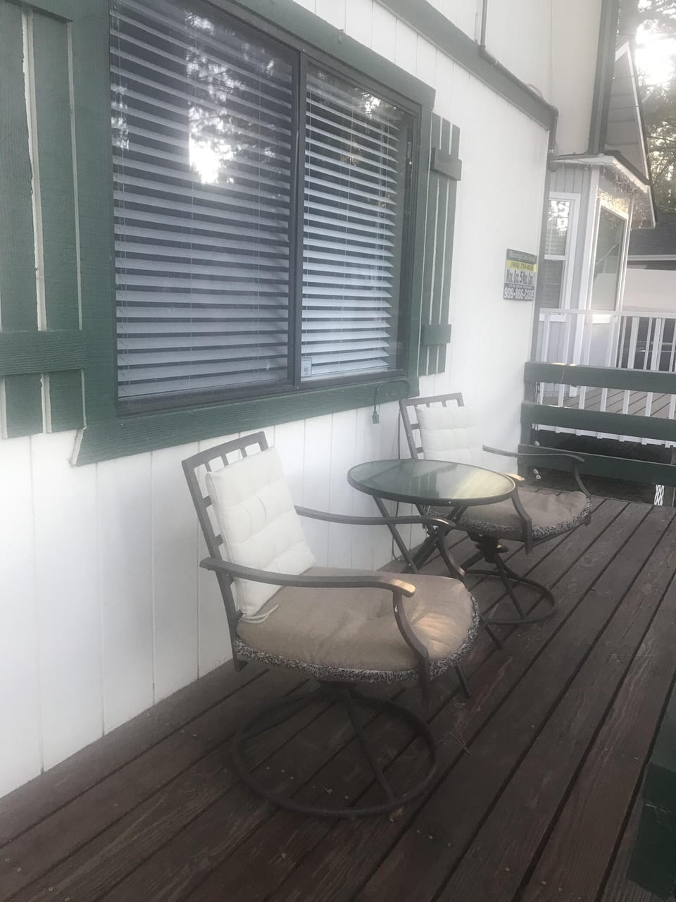 Relax on the front porch enjoying morning hot drink 