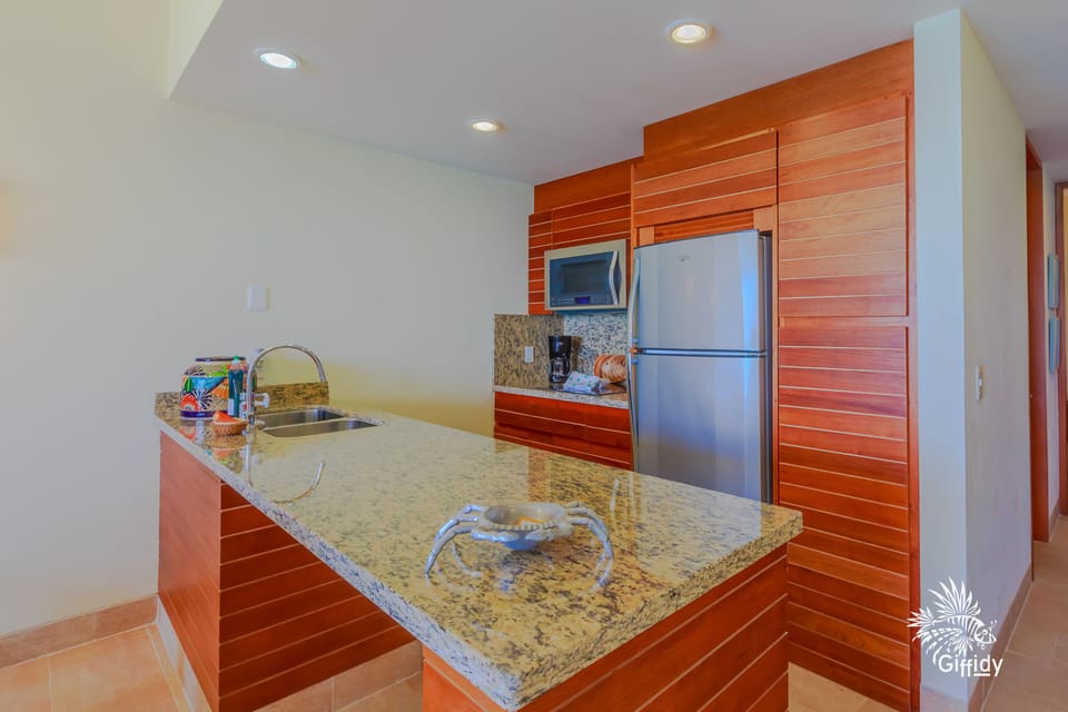 Kitchen has everything you would need including an Expresso Machine