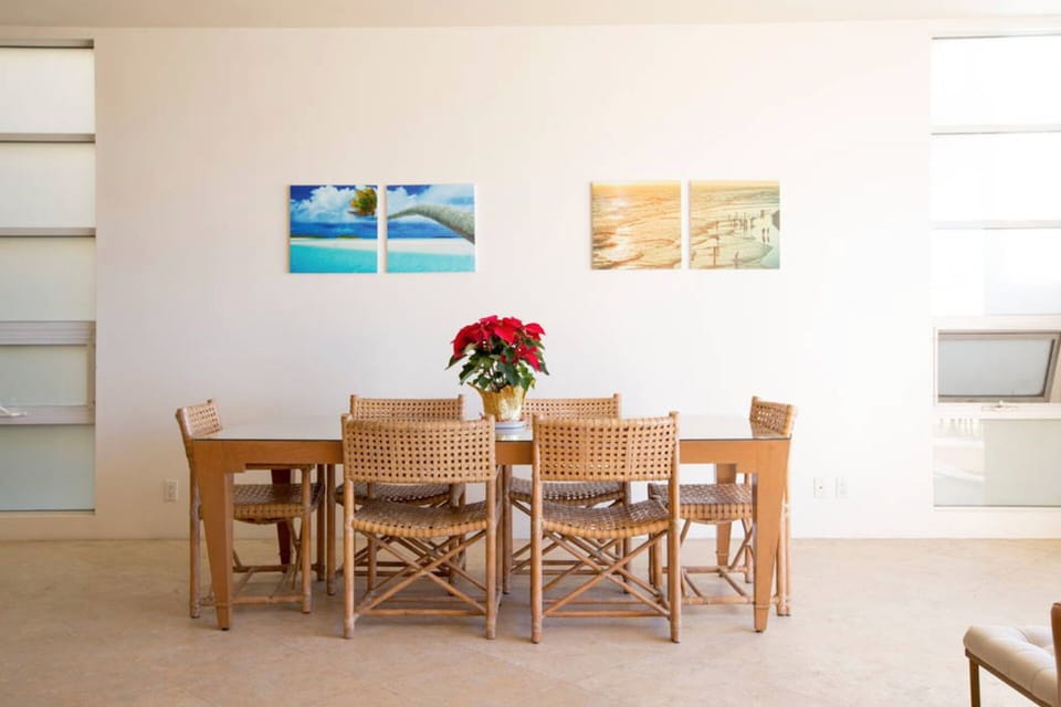 The open floorplan mixes the Living Room, Dining Room and Kitchen