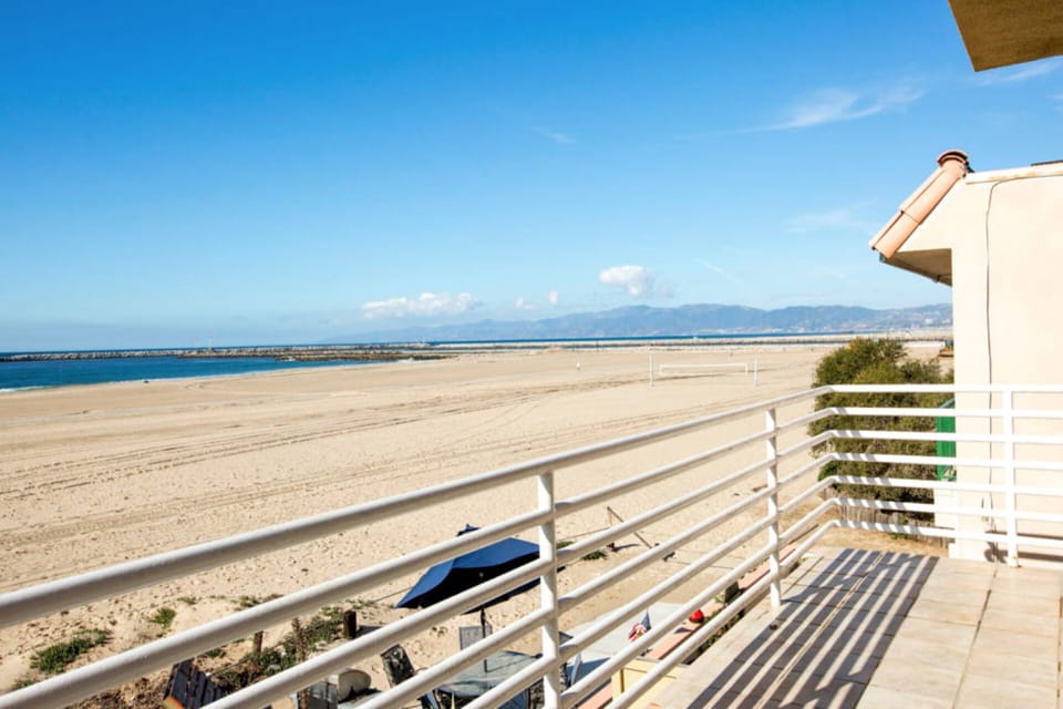 Step onto the Master Suite's Private Terrace for unobstructed sand & ocean views