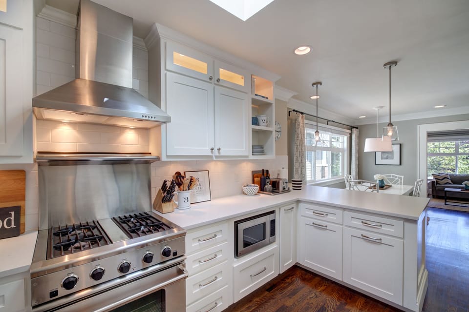 Professional gas range and hood lets you cook for family and friends in style. 