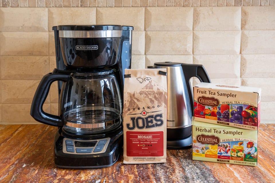 Stocked with coffee maker and tea. 