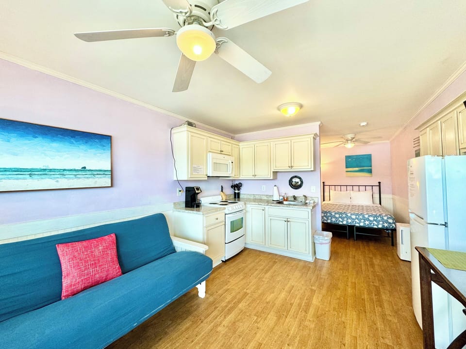 300 sqft studio unit with queen bed.
