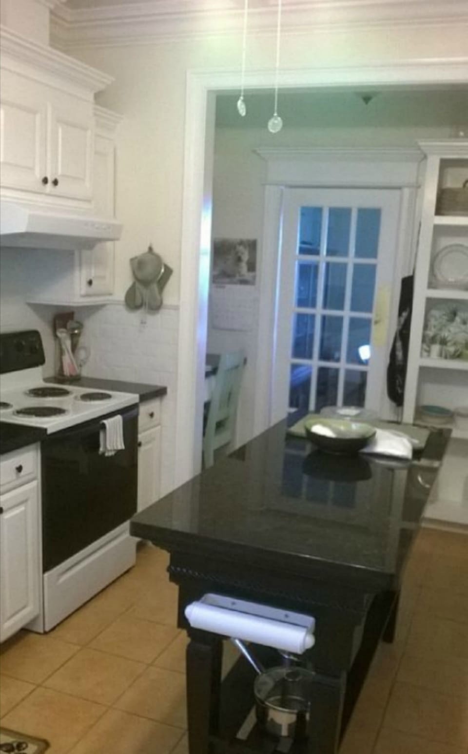 Kitchen door to the dinning table. Every appliance you will need.