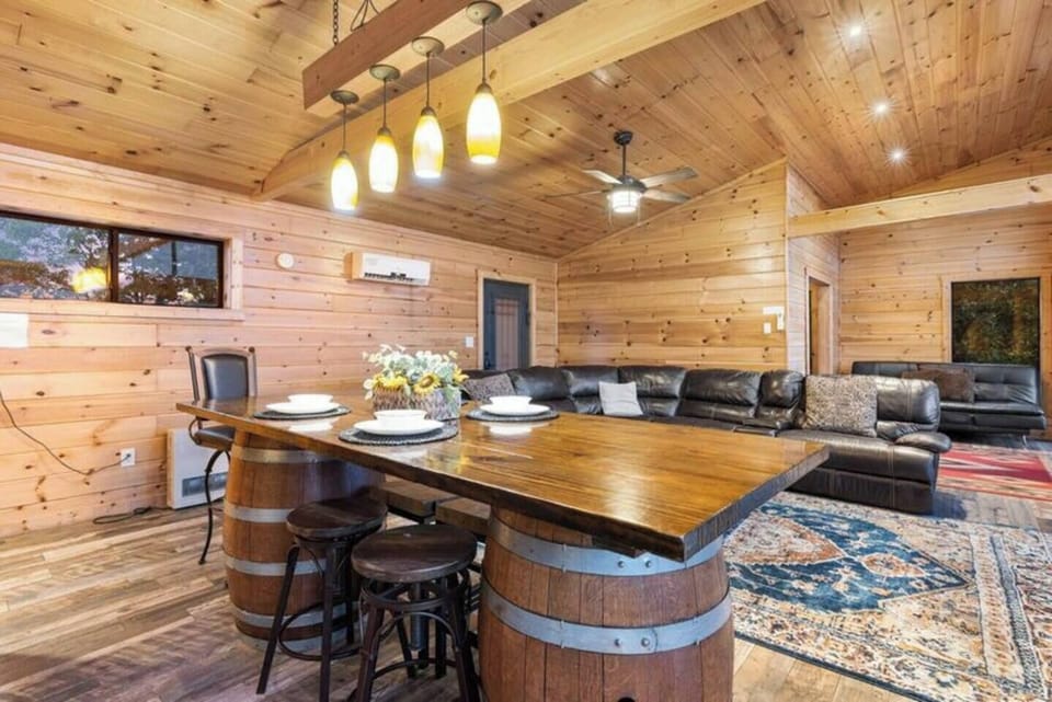 Gather around the bar that rests on two beautiful imported wine barrels
