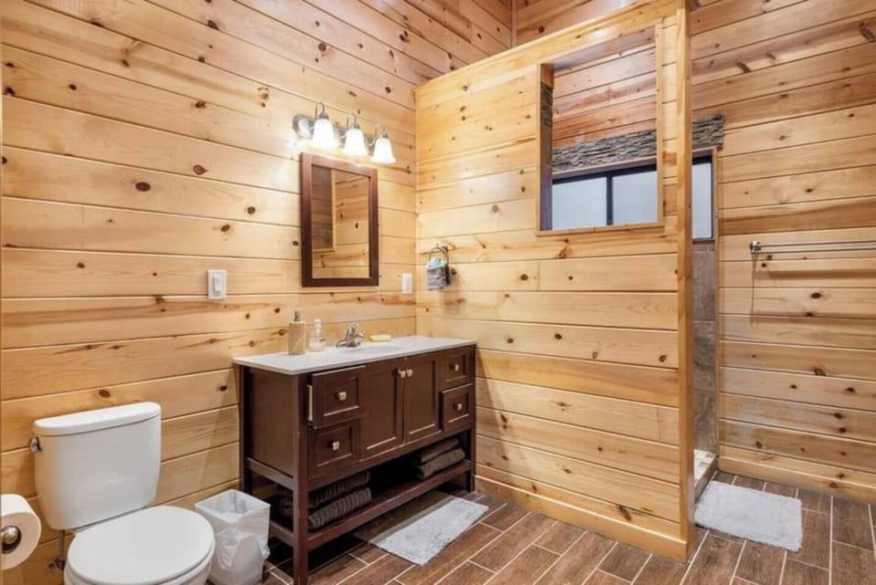 A spacious, full bathroom just off the Master