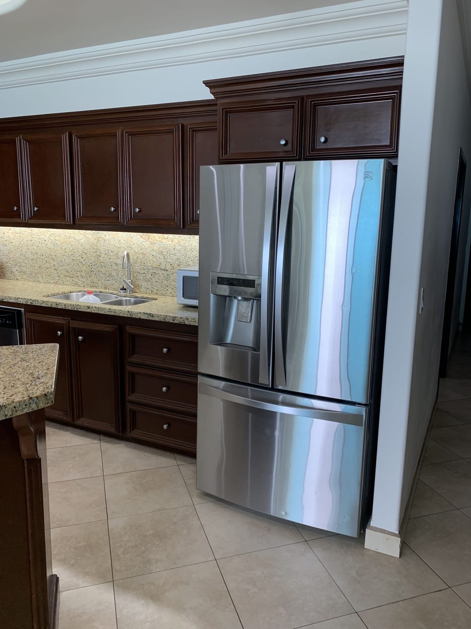 Kitchen Refrigerator and Cabinets/Counter Tops