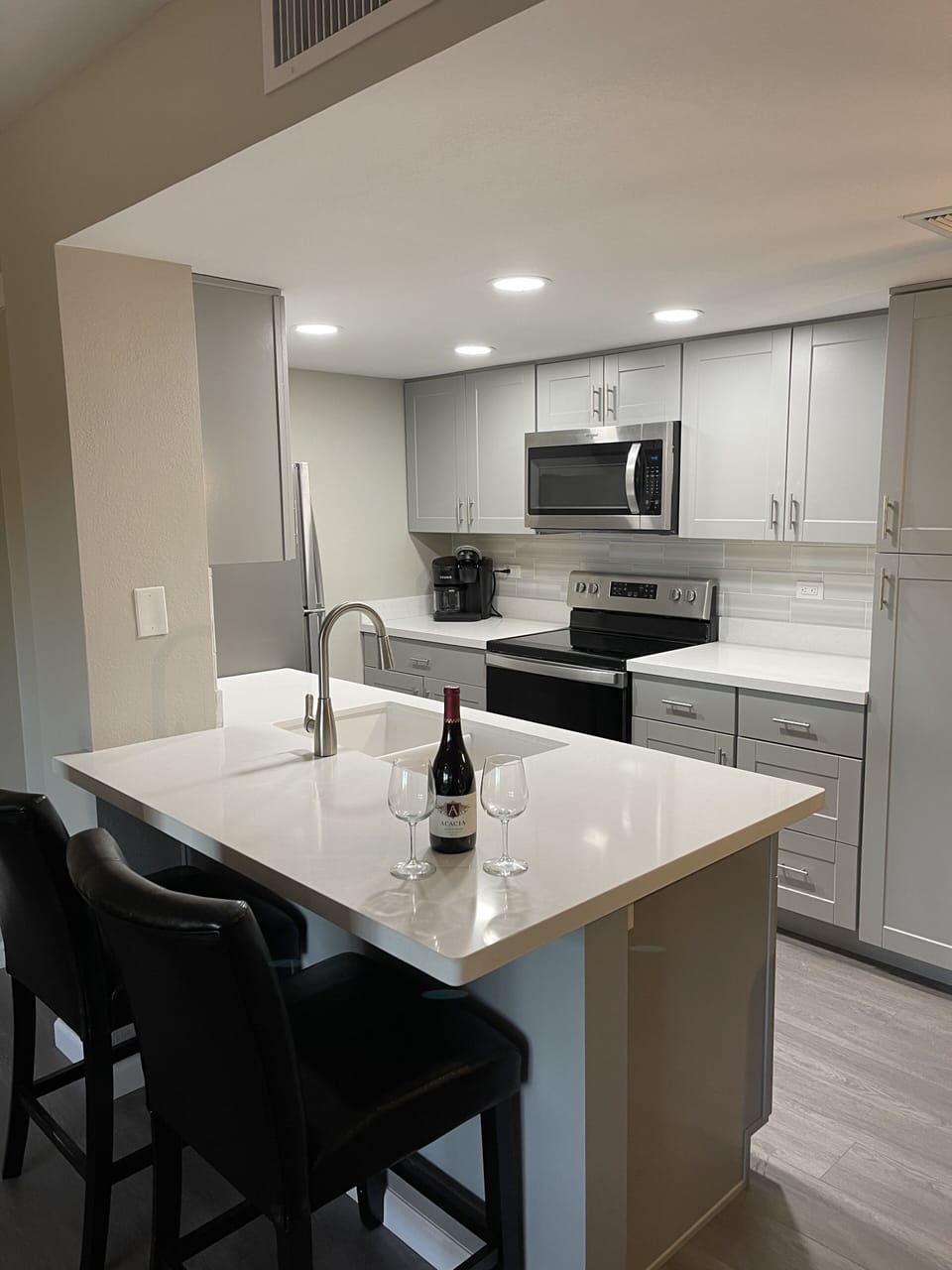 The view from the family room into the kitchen
