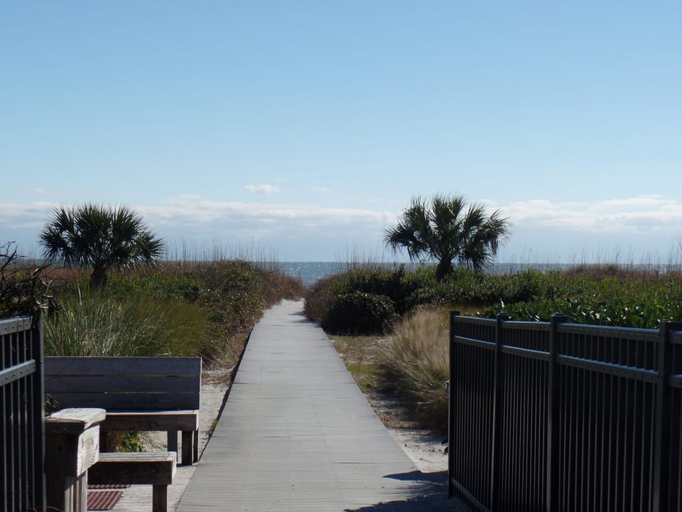 Boardwalk to beach, steps away from our villa
