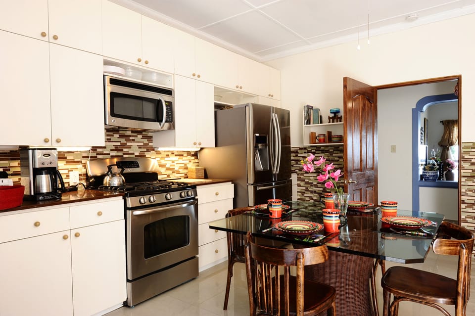 kitchen has all the modern  conveniences and appliances