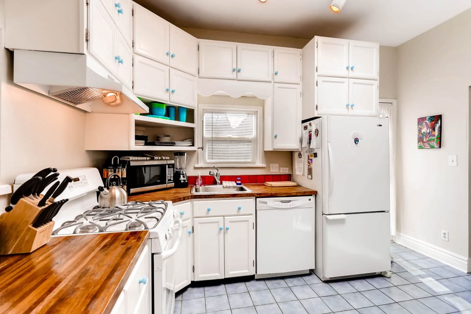 Fully stocked Kitchen with Butcher Block Countertops and Gas Range/Oven