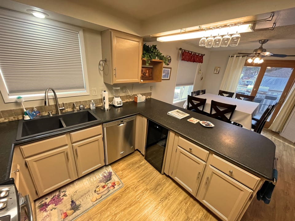 New S/S appliances, Granite counter & sink, built in climate control wine cooler