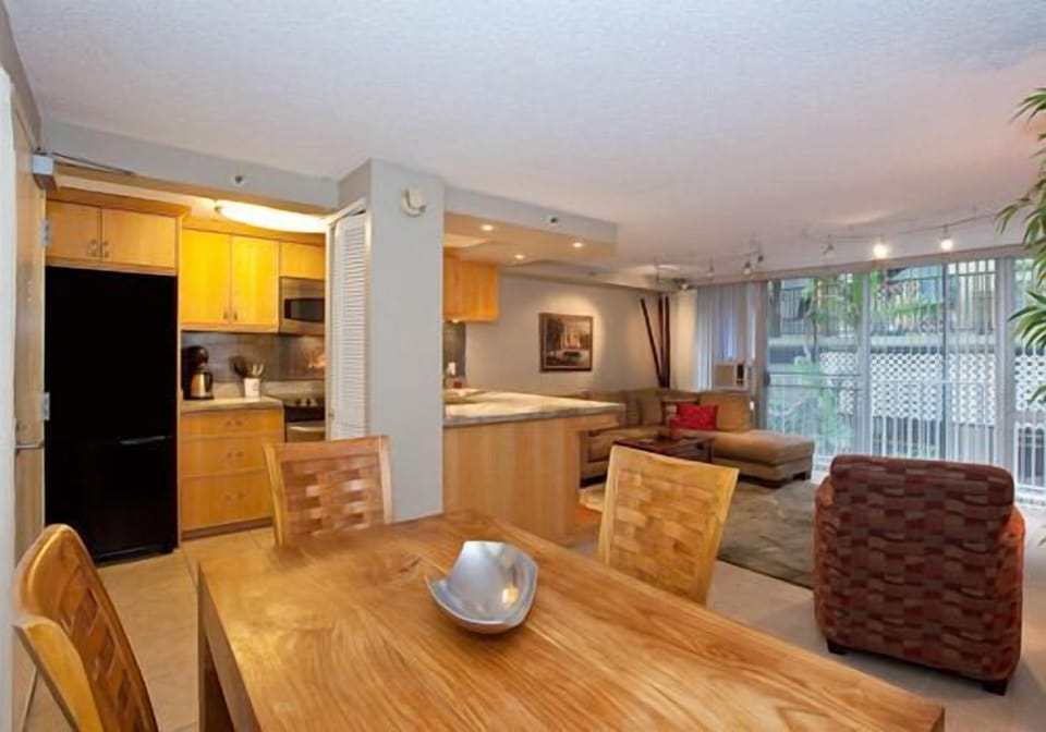 Dining room table seats 4 guests.
