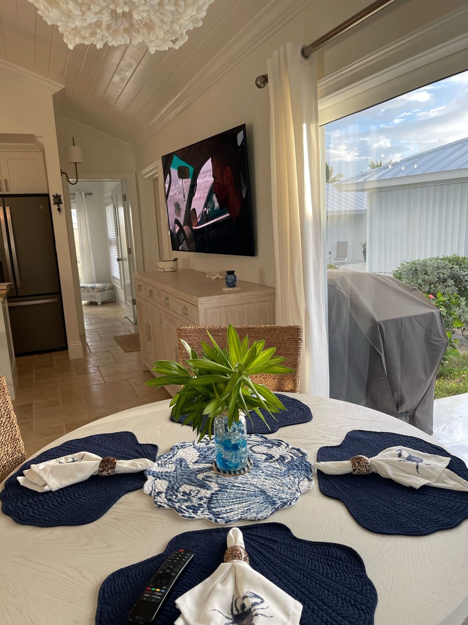 Eat-in dining room with extra large smart TV