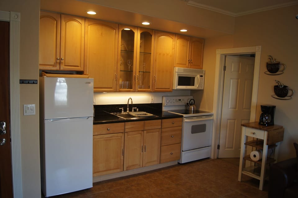 Fully Equipped Kitchen with Everything Needed to Prepare Meals During your Stay.