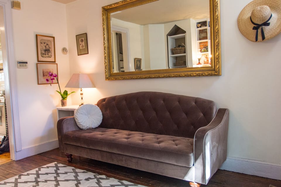 Living room sofa converts into a full-sized bed