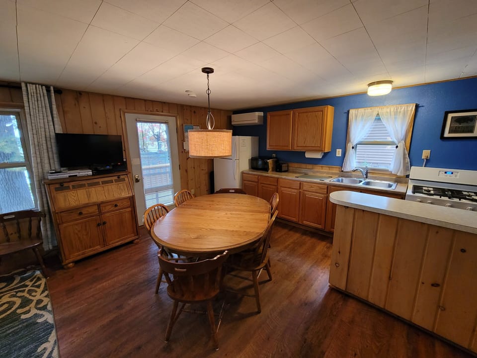 Fully equipped kitchen is integral to the living room space