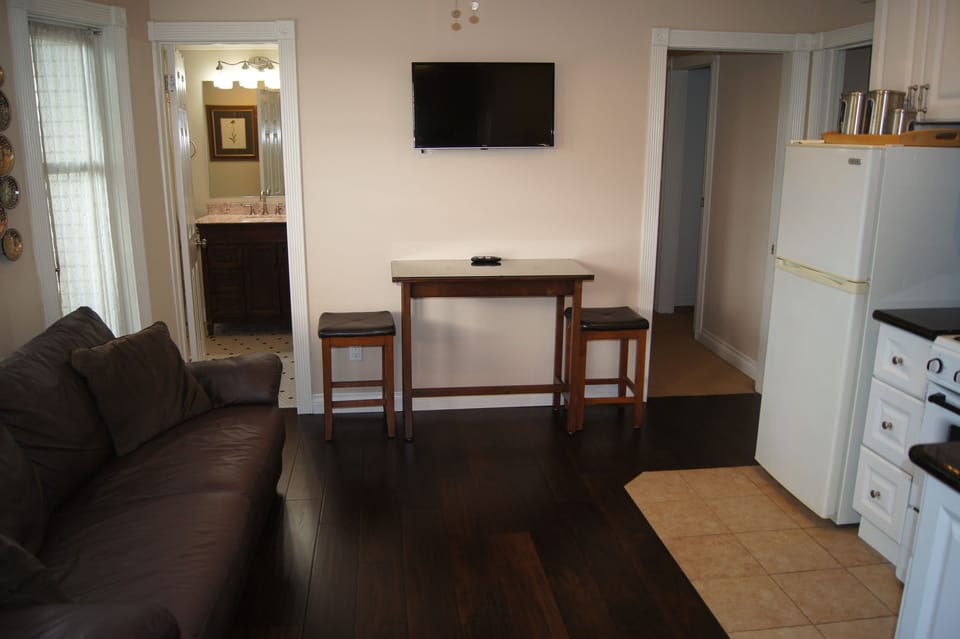 Living area with LED Smart TV. Cable TV, and Streaming