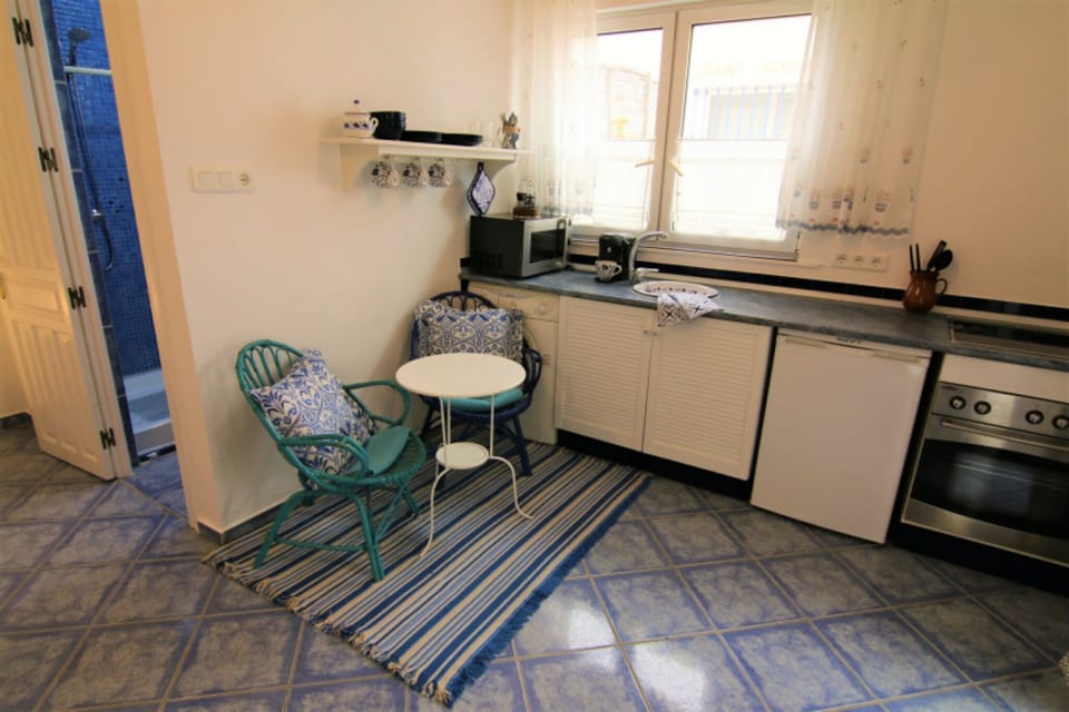 Open plan kitchenette/dinning area at Studio ' Torre'