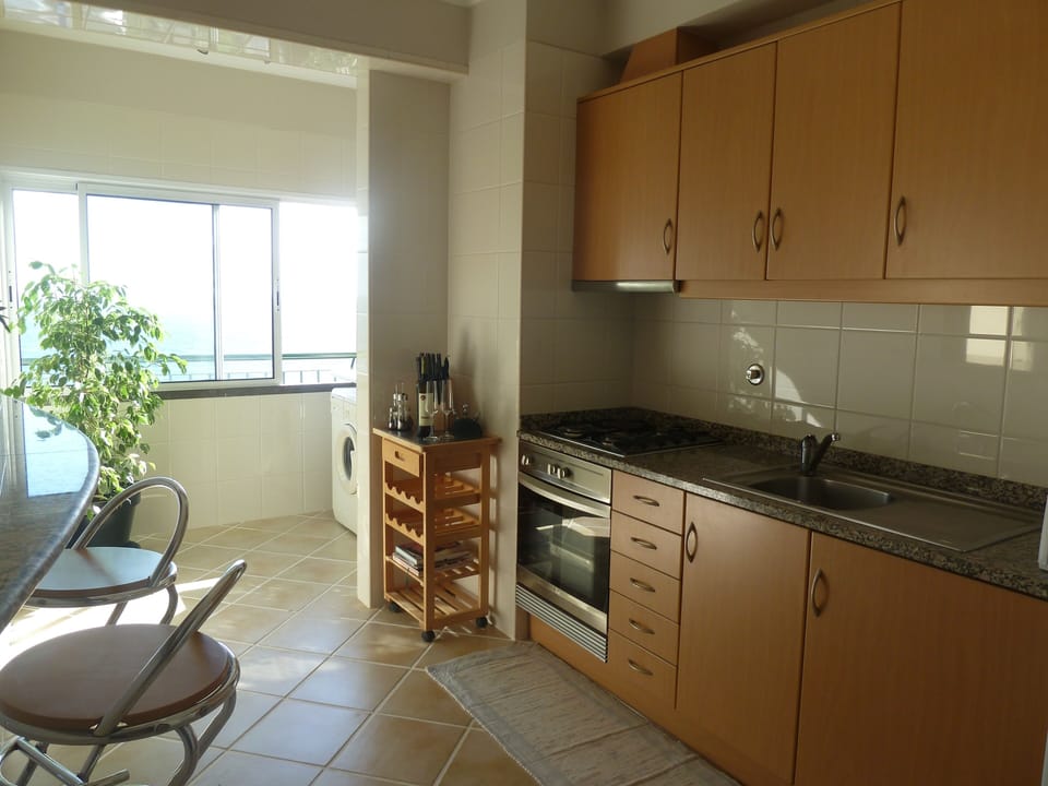 Kitchen Area with Separate Utility Zone.