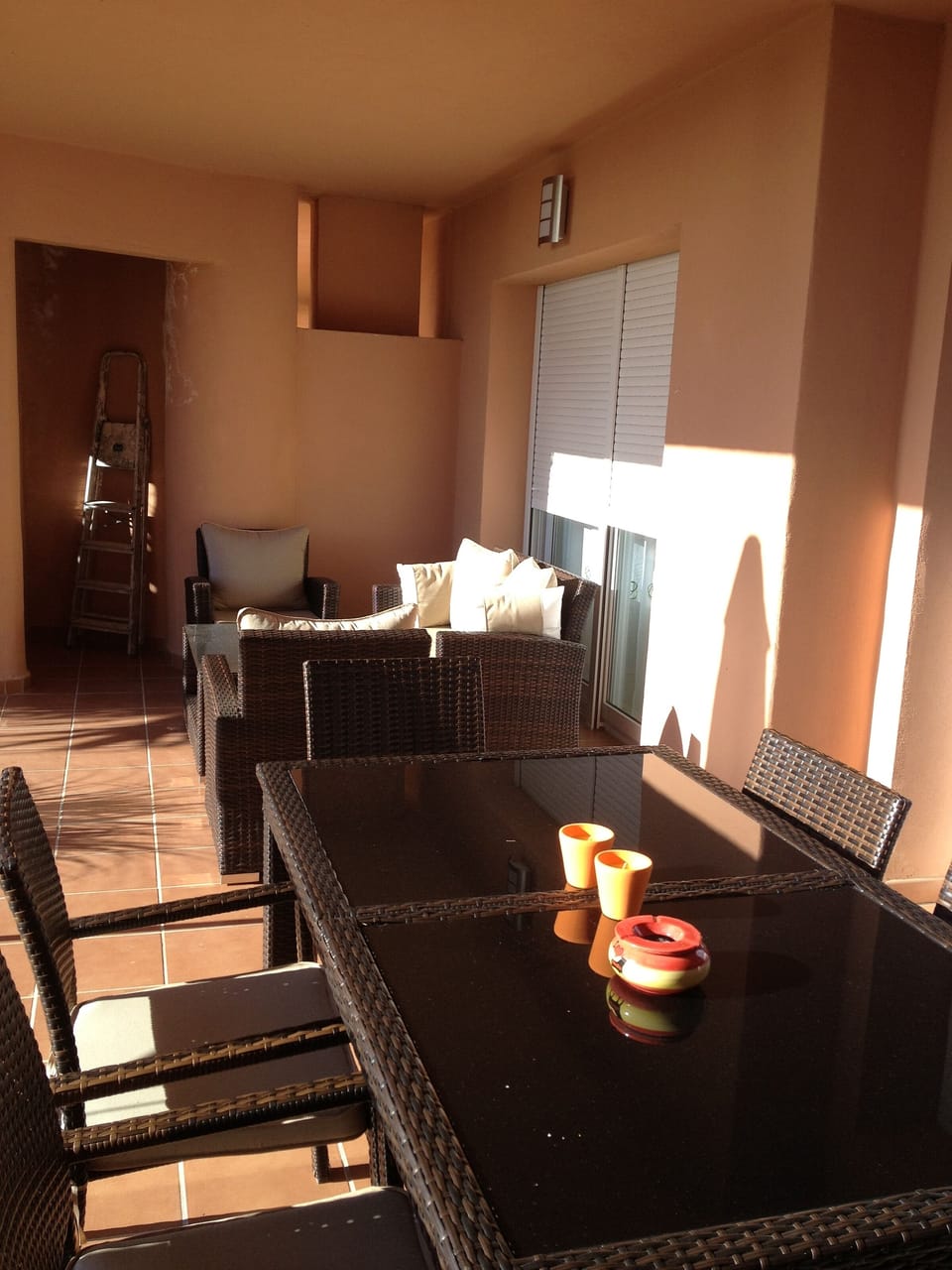 covered terrace with eating and lounge corner