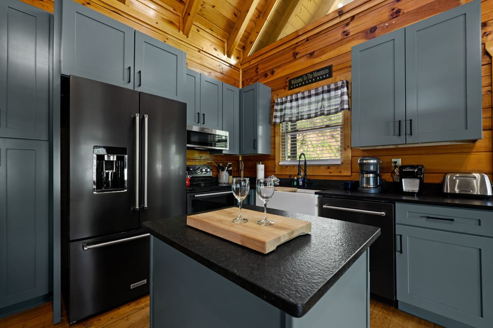 KitchenAid Black Stainless appliances with plenty of cabinet storage 