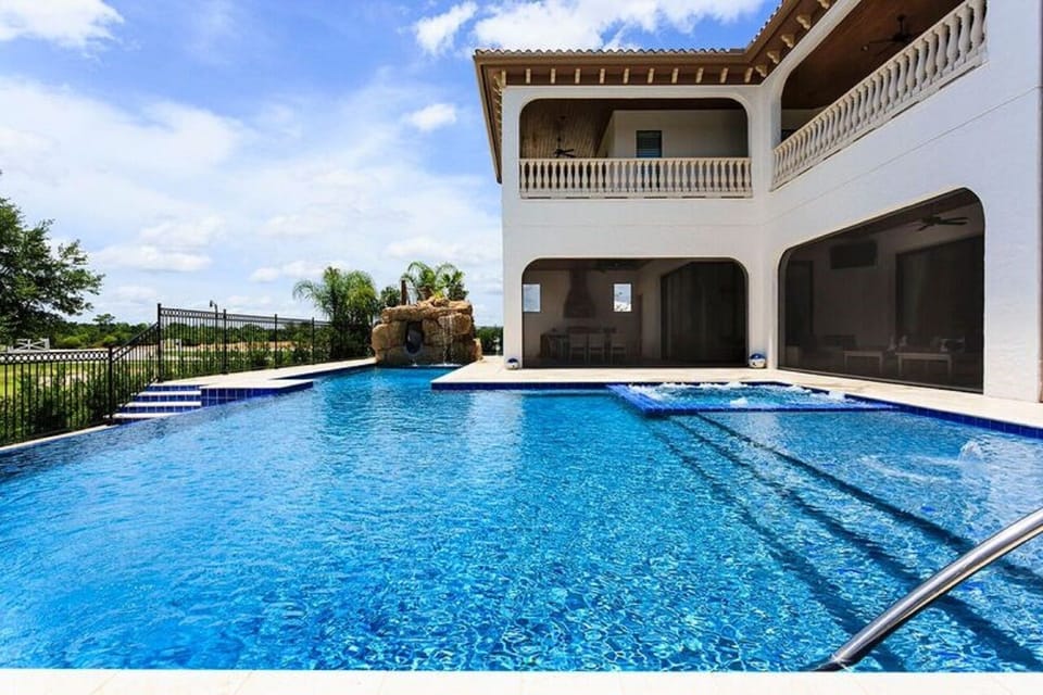 Bask in the sun relaxing as you float in this large infinity pool.