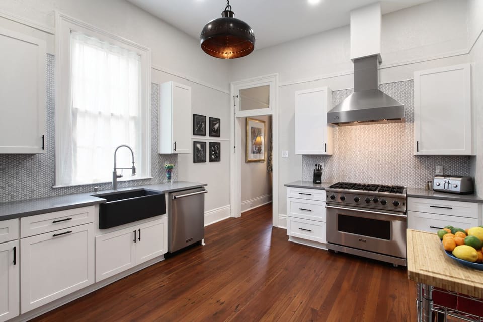 Newly renovated kitchen with Viking appliances & original antique pine flooring.