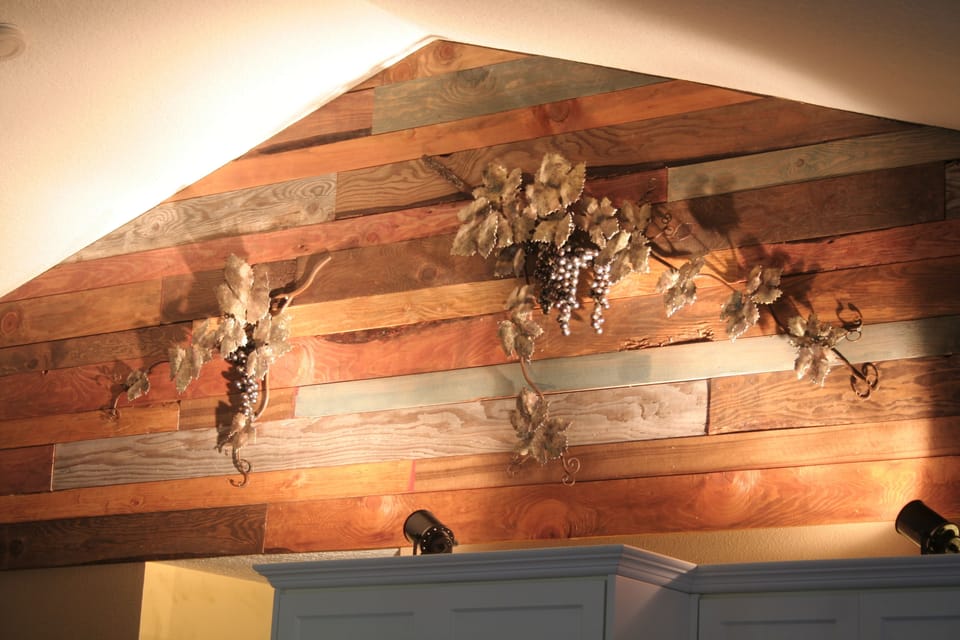 custom built wood wall with hand made plasma cut grape vines & grapes