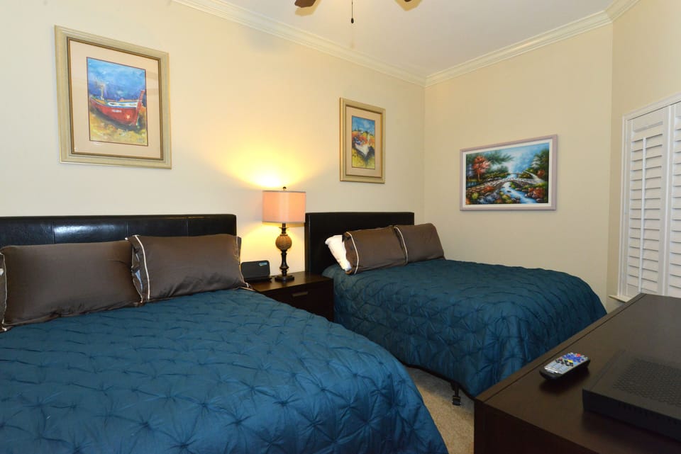 Third Bedroom with Two Full Beds, 40' Smart TV, and Private Full Bath