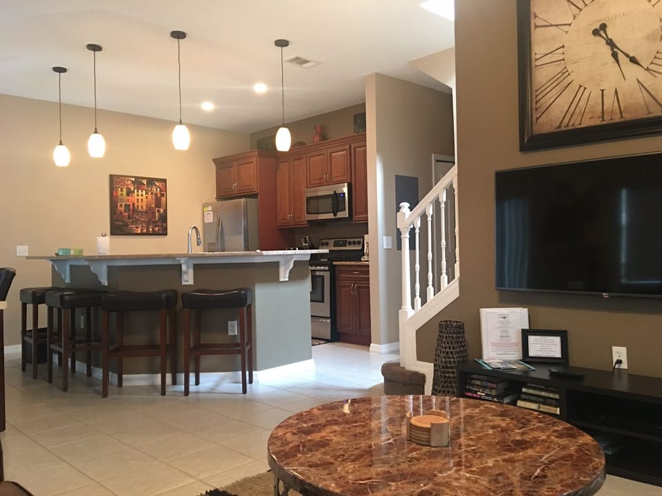 View from Couch looking toward DR, Kitchen 
