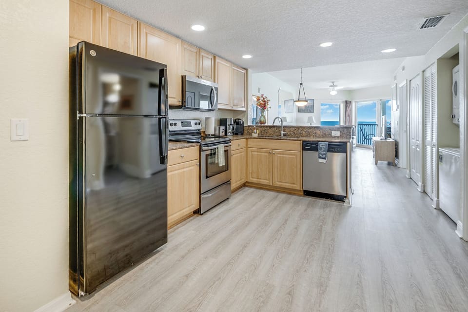 Full kitchen: refrigerator, dishwasher, stove/oven, microwave, coffee makers.  