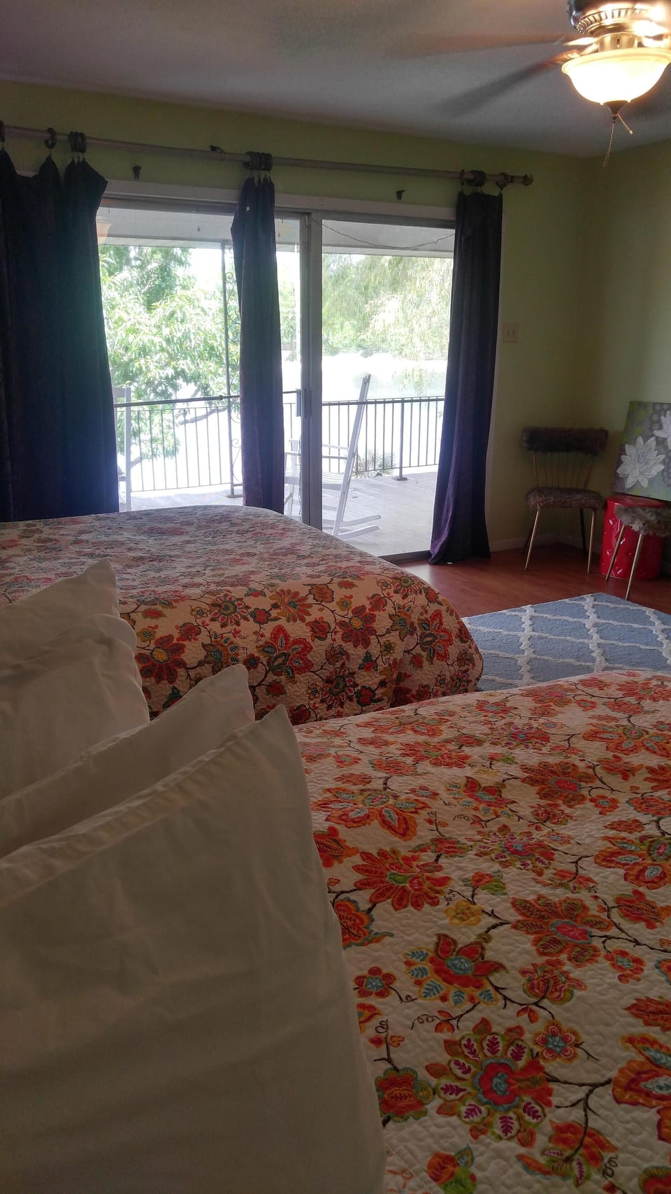 3rd bedroom view of the bayou 2 queen beds and en suite bathroom
