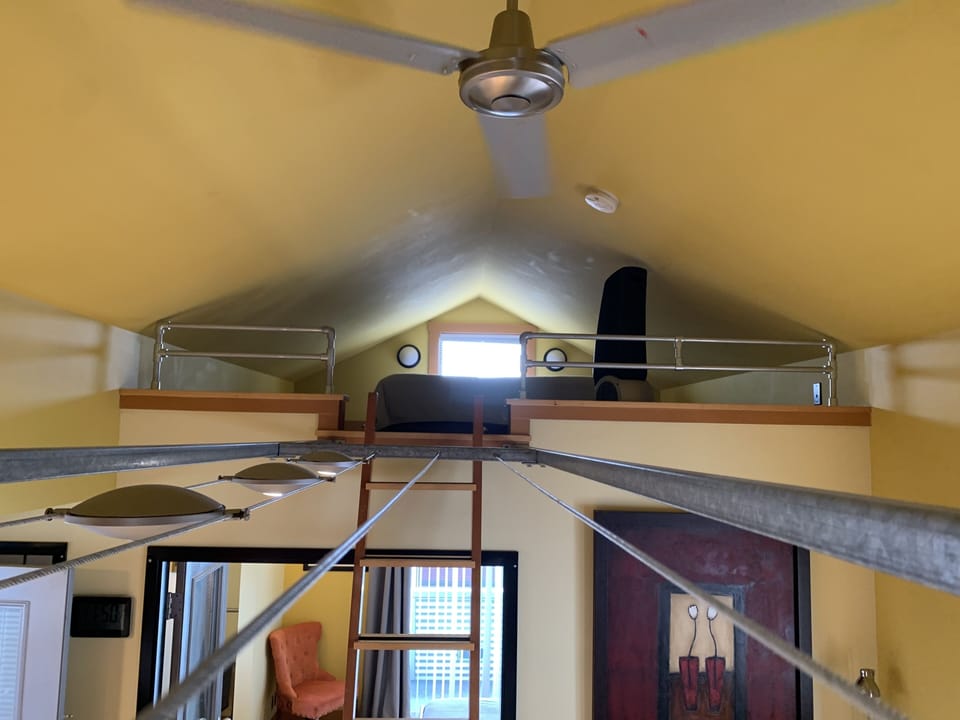 south loft (queen bed and motion sensor light at the loft entrance)