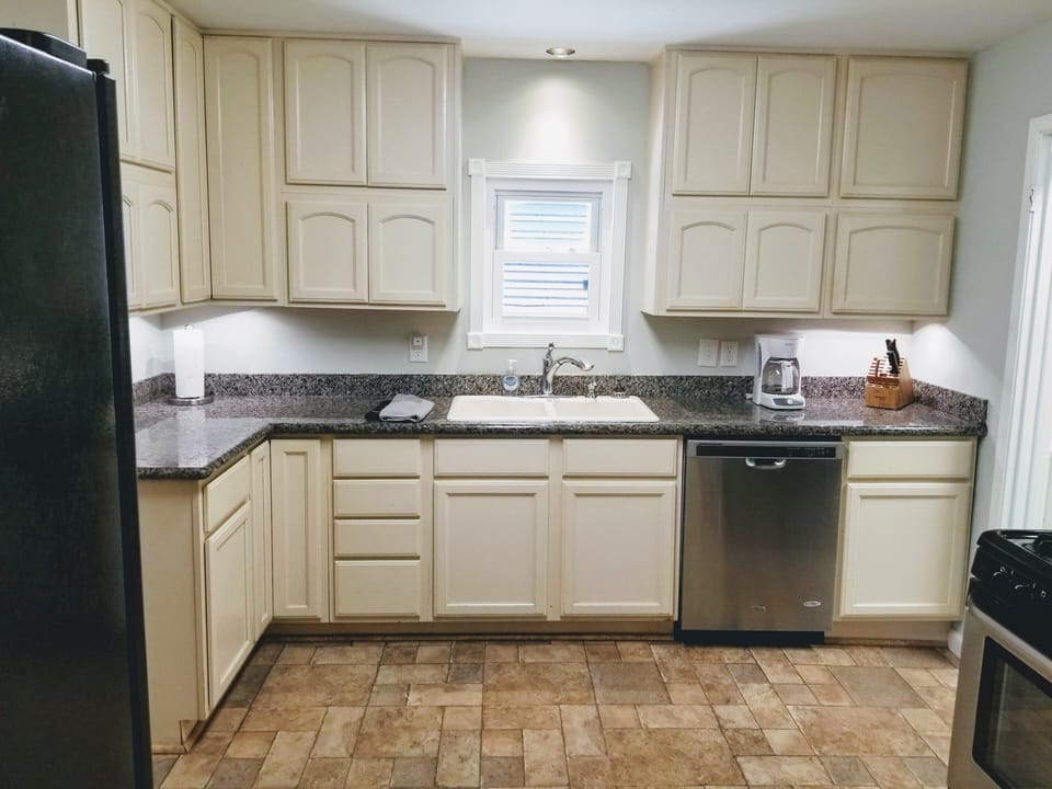 Kitchen stocked with it all!  Laundry room with full size washer and dryer.