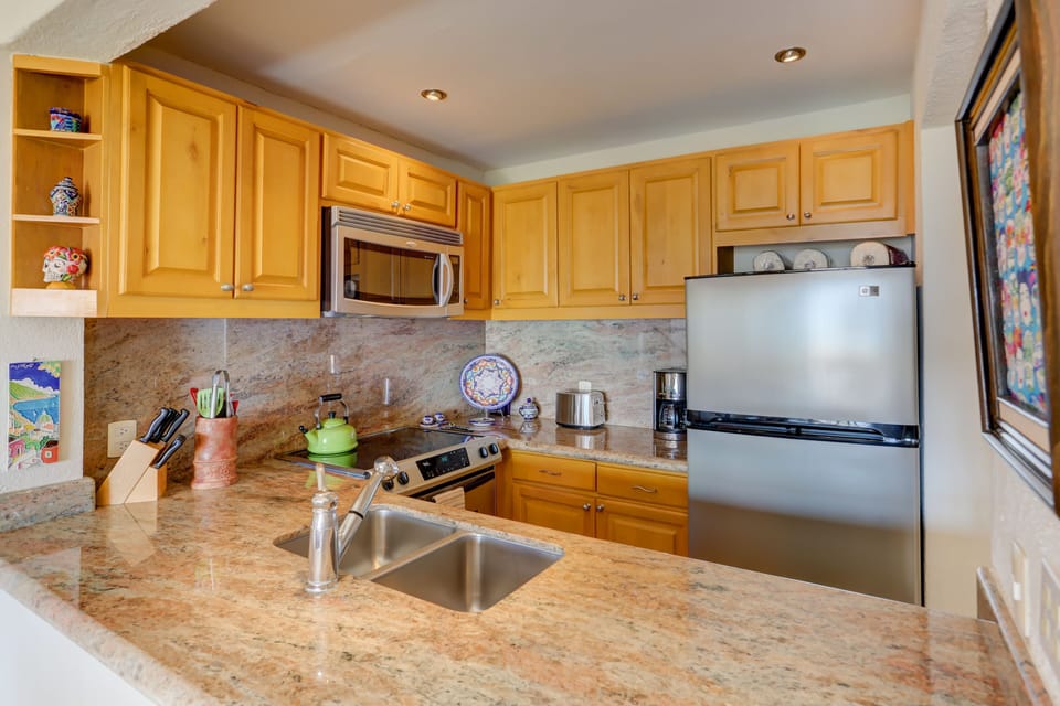 There is everything you need in this compact kitchen
